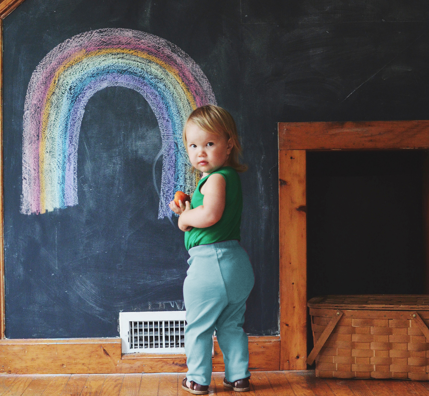 a toddler wearing blue cloth diaper pants from primary.com