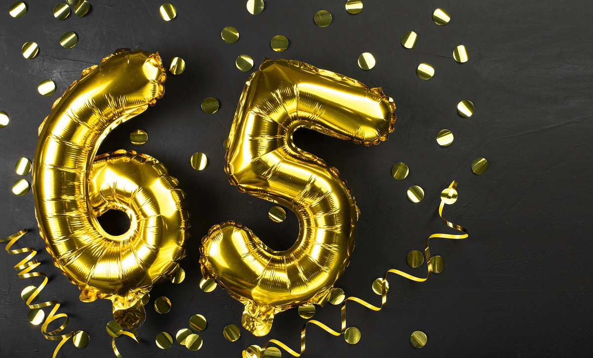 balloons with the number 65: enroll in Medicare