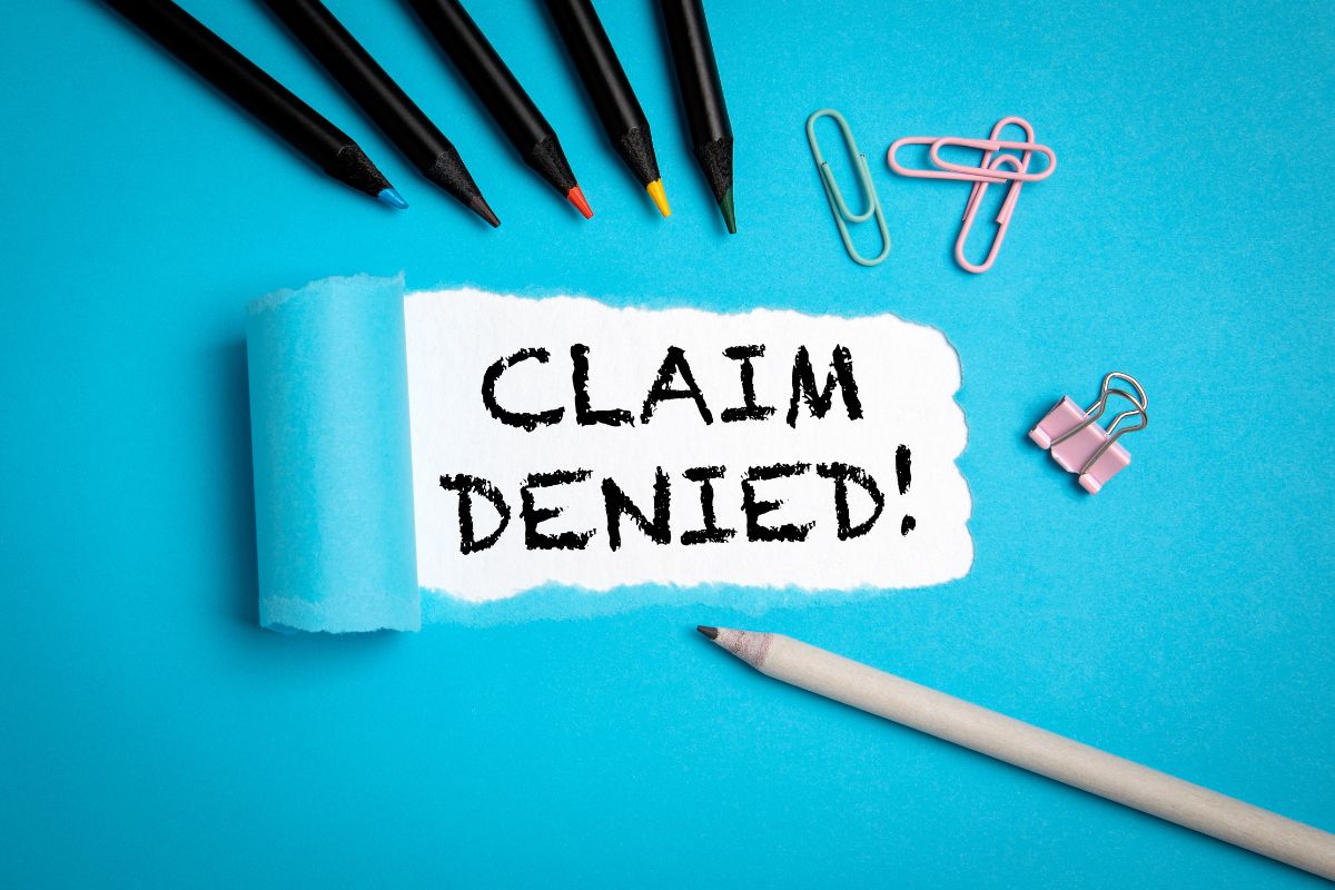 Page with "Claim Denied" written on it.
