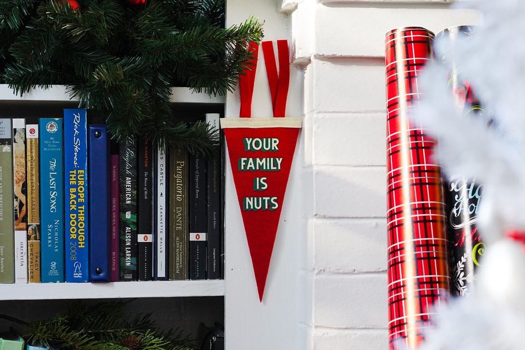 your family is nuts pennant near christmas decorations