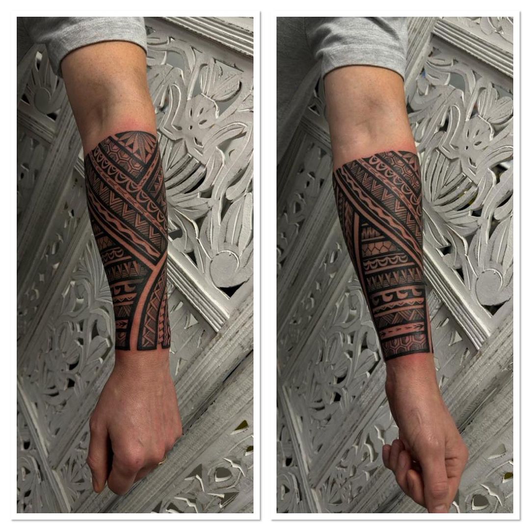 blackwork tribal half sleeve tattoo by studio tatatau