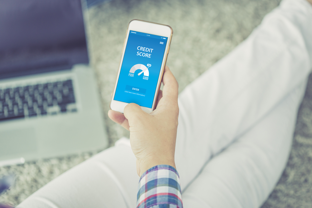 Person checking their credit score at home