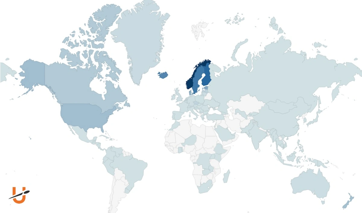 A world map with countries in different blues and grays showing where the most disc golf rounds pers capita are played in the world