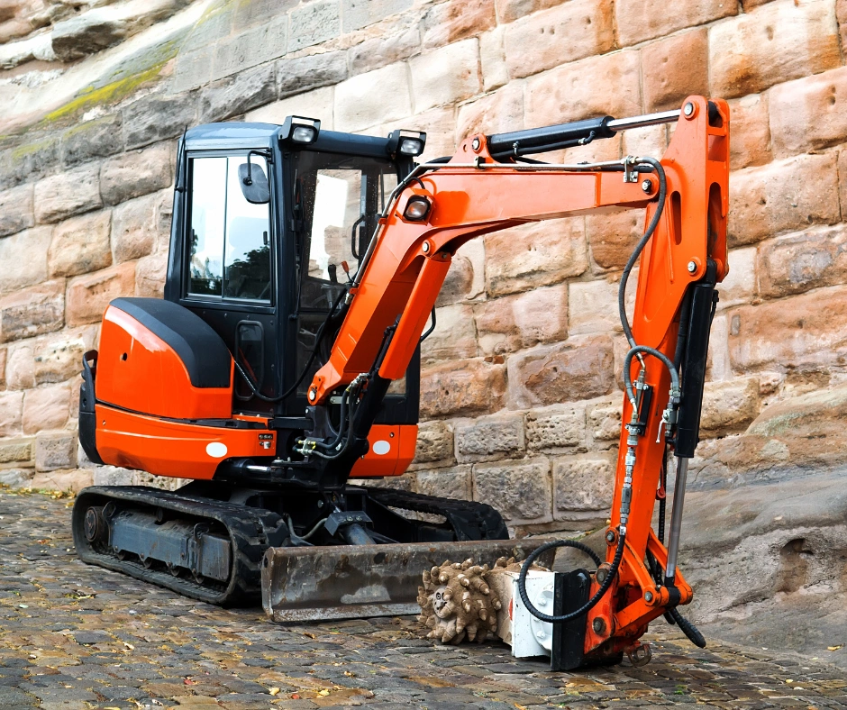 mini excavator on pathway