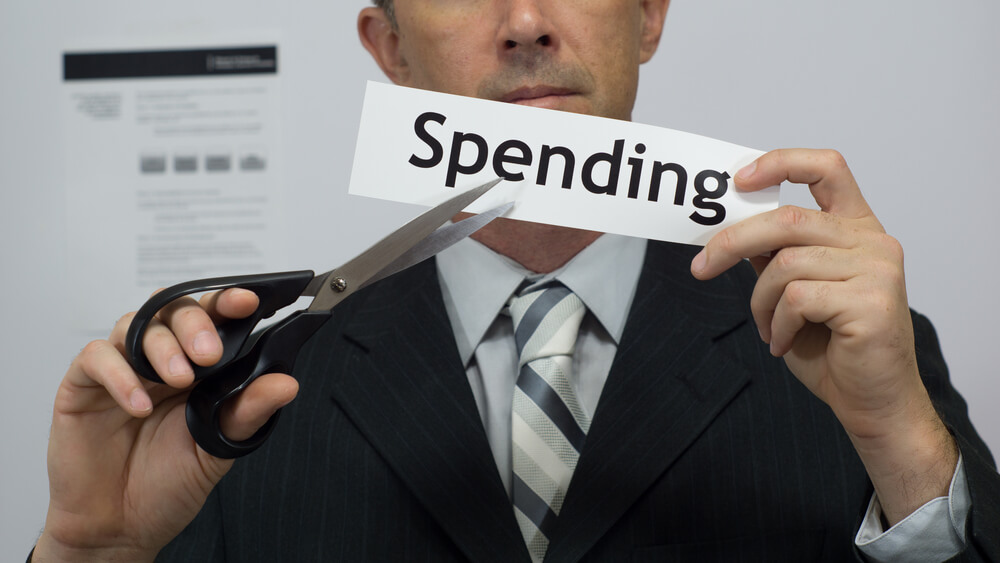 cutting spending to repay a loan