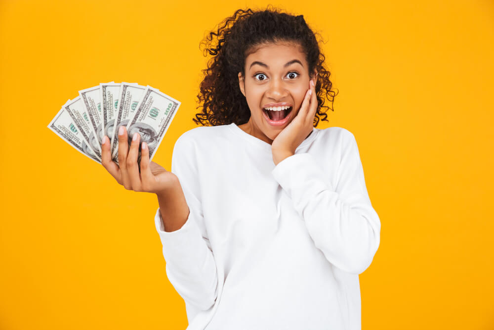 woman happy about payday loan cash