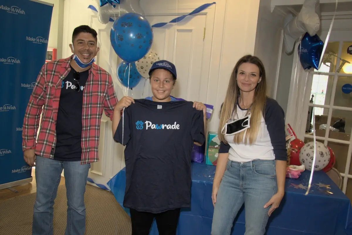Pawrade staff grants a Make-A-Wish request for Juan Alonso