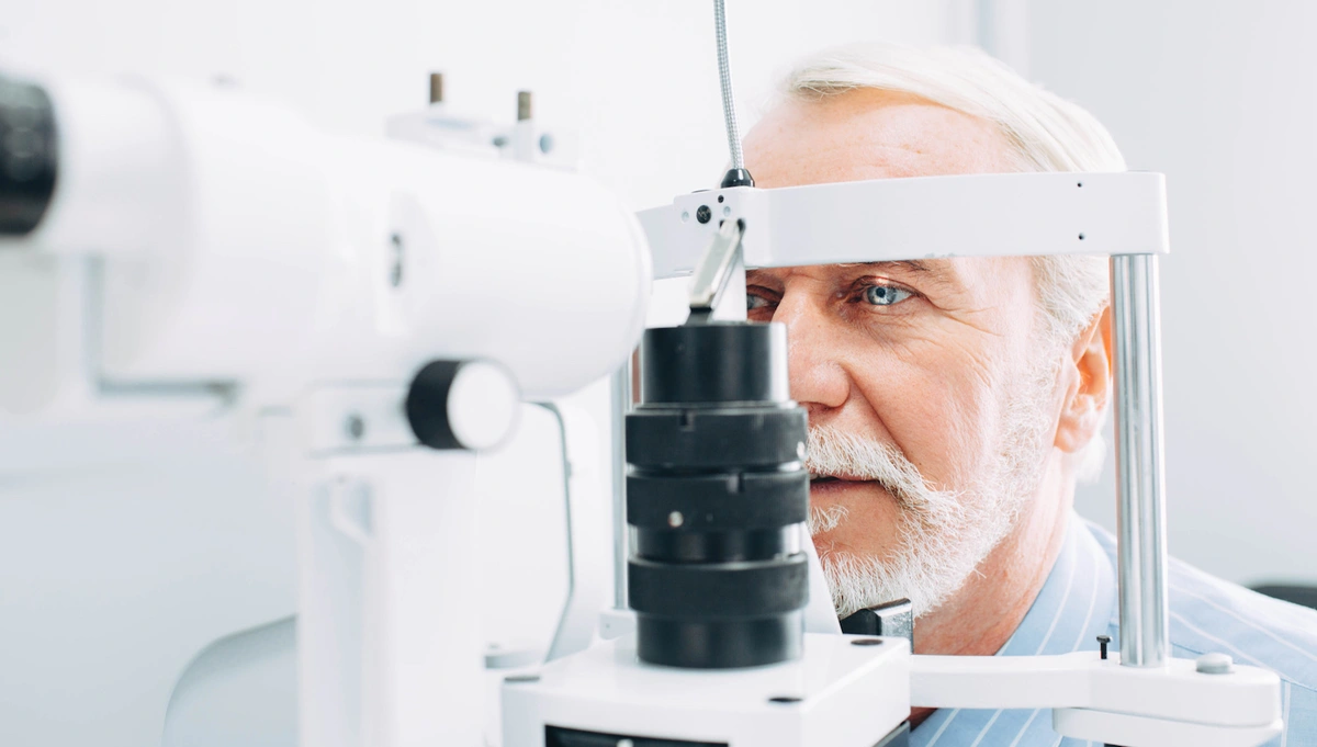 man getting eye exam and vision services with Medicare