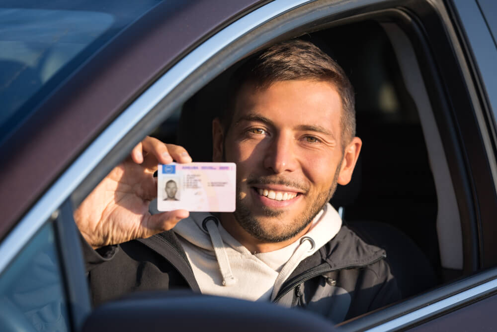 man using his ID to get a title loan