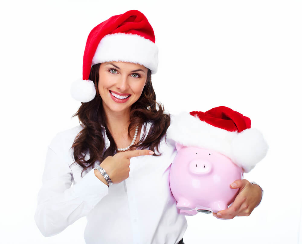 Woman holding piggy bank full of title loan money