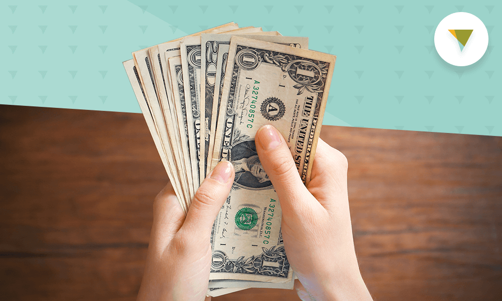 Hand holding money
