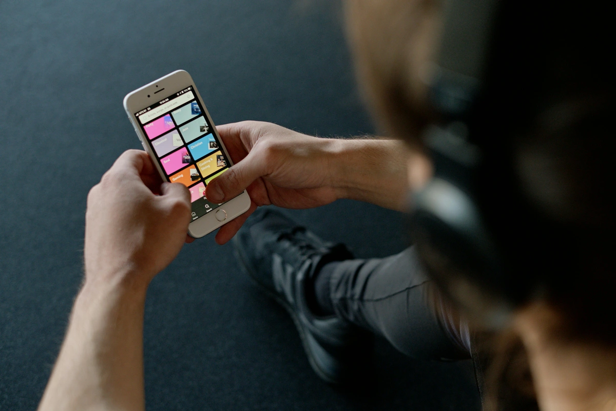Person browsing Spotify on their smartphone