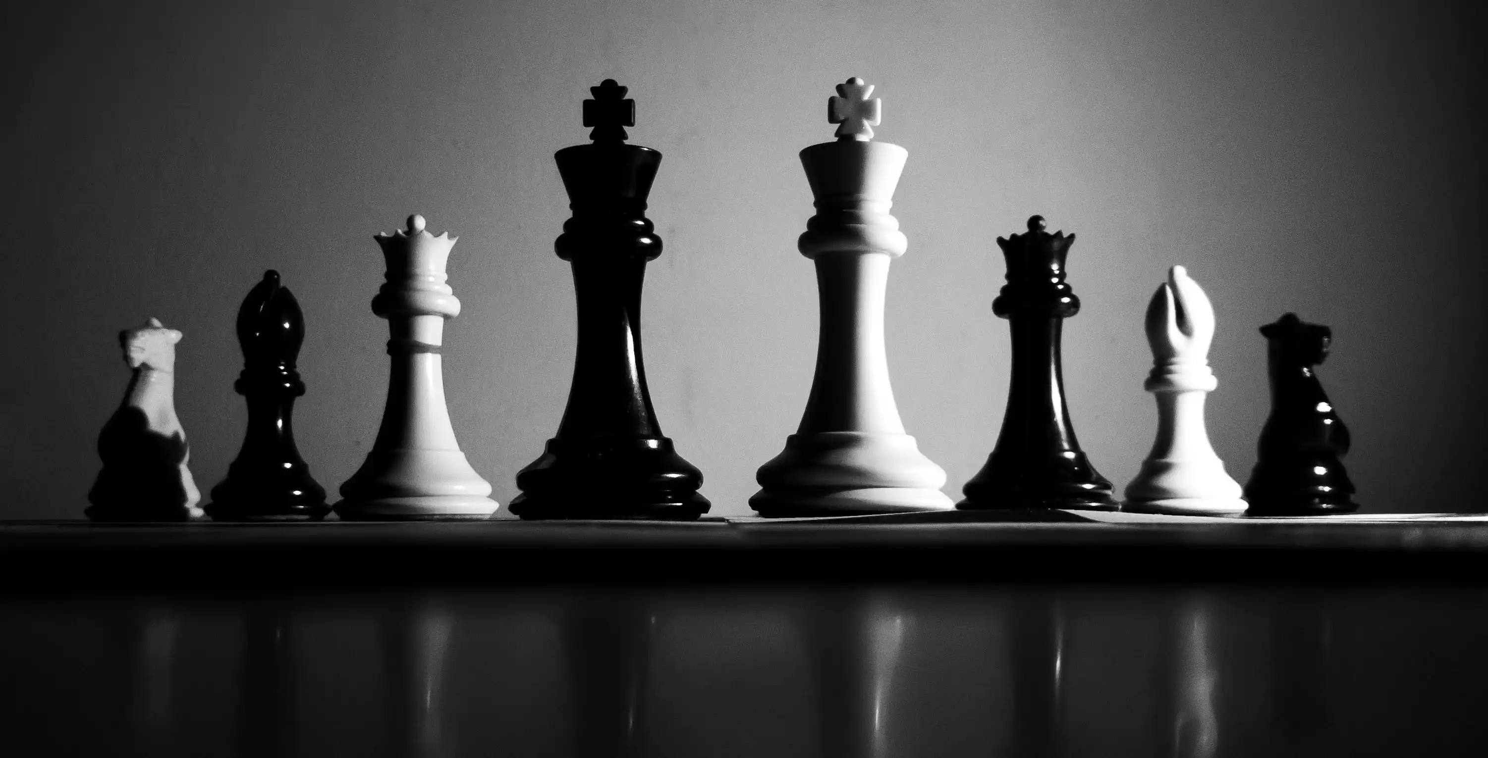 Strategic leadership concept with chess pieces representing decision-making in global sourcing