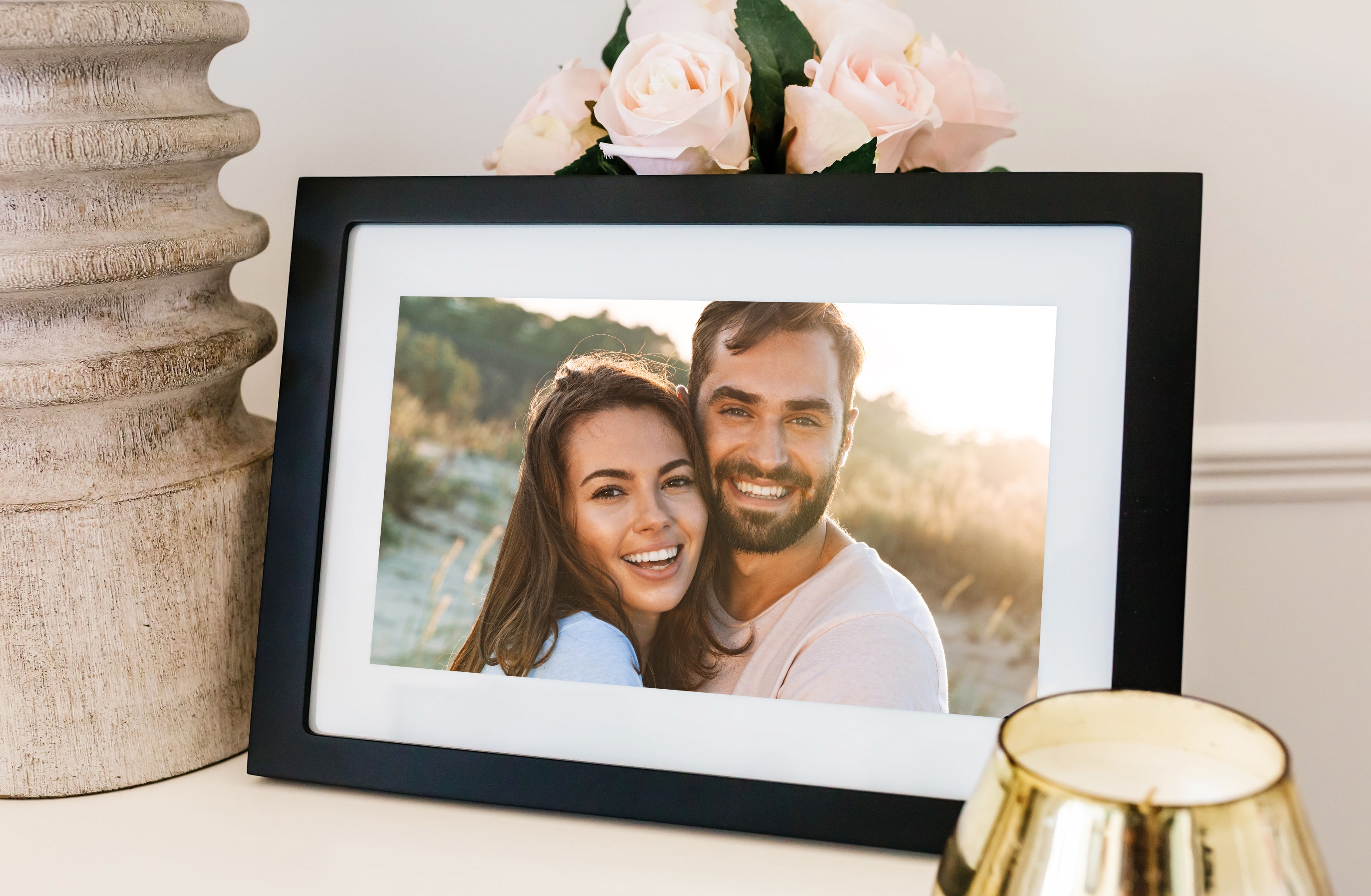 Happy couple displayed on digital photo frame