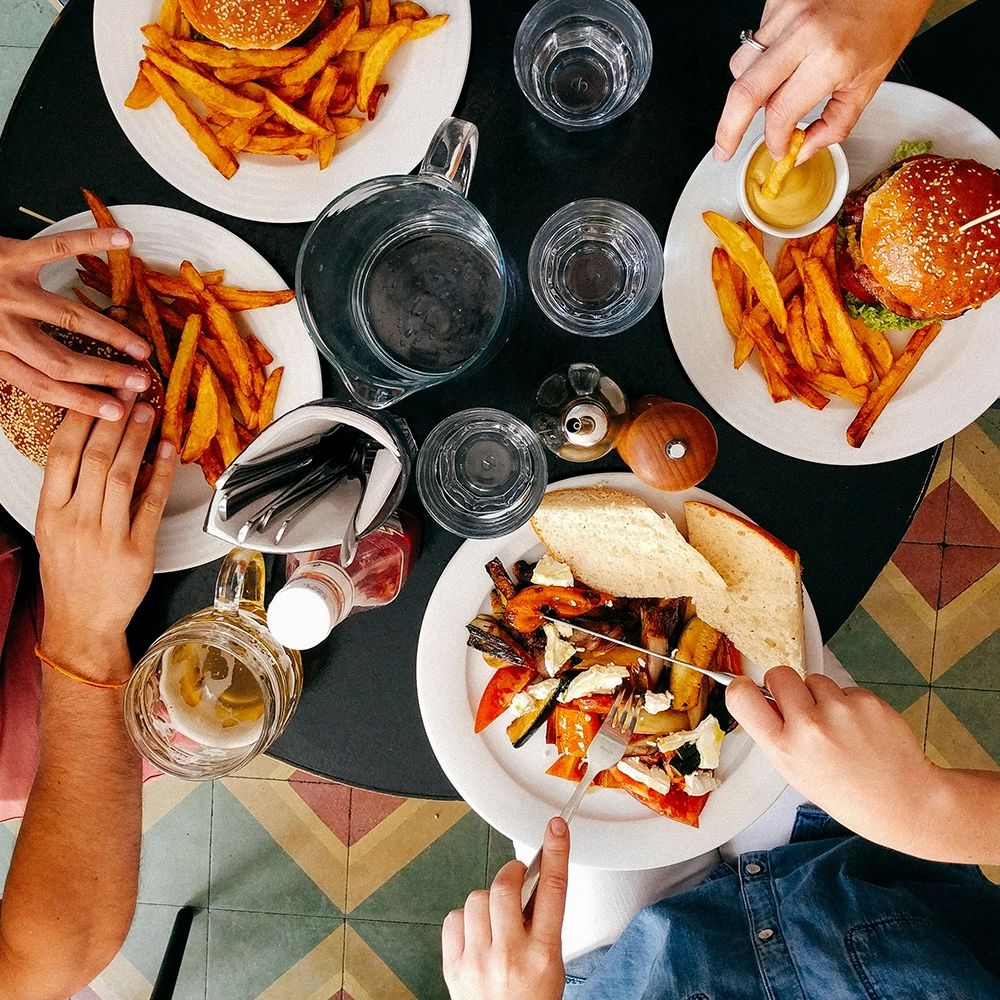 Overhead shot of a table of people sharing food