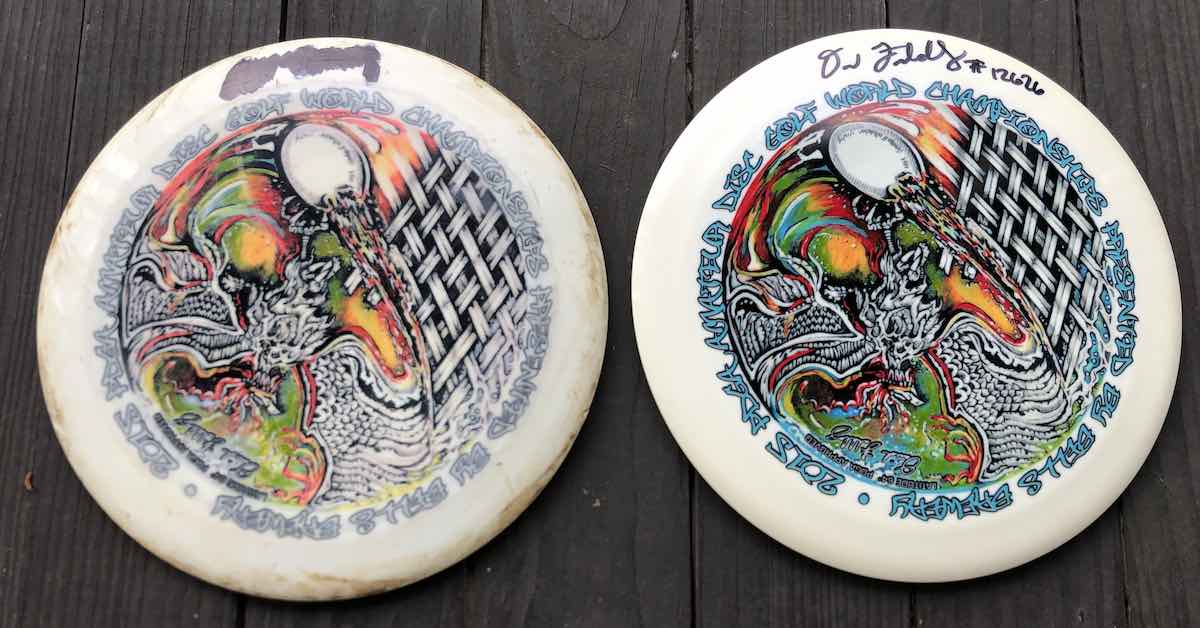 Two colorfully dyed discs, one with a signature marked out and the other witha clear signature