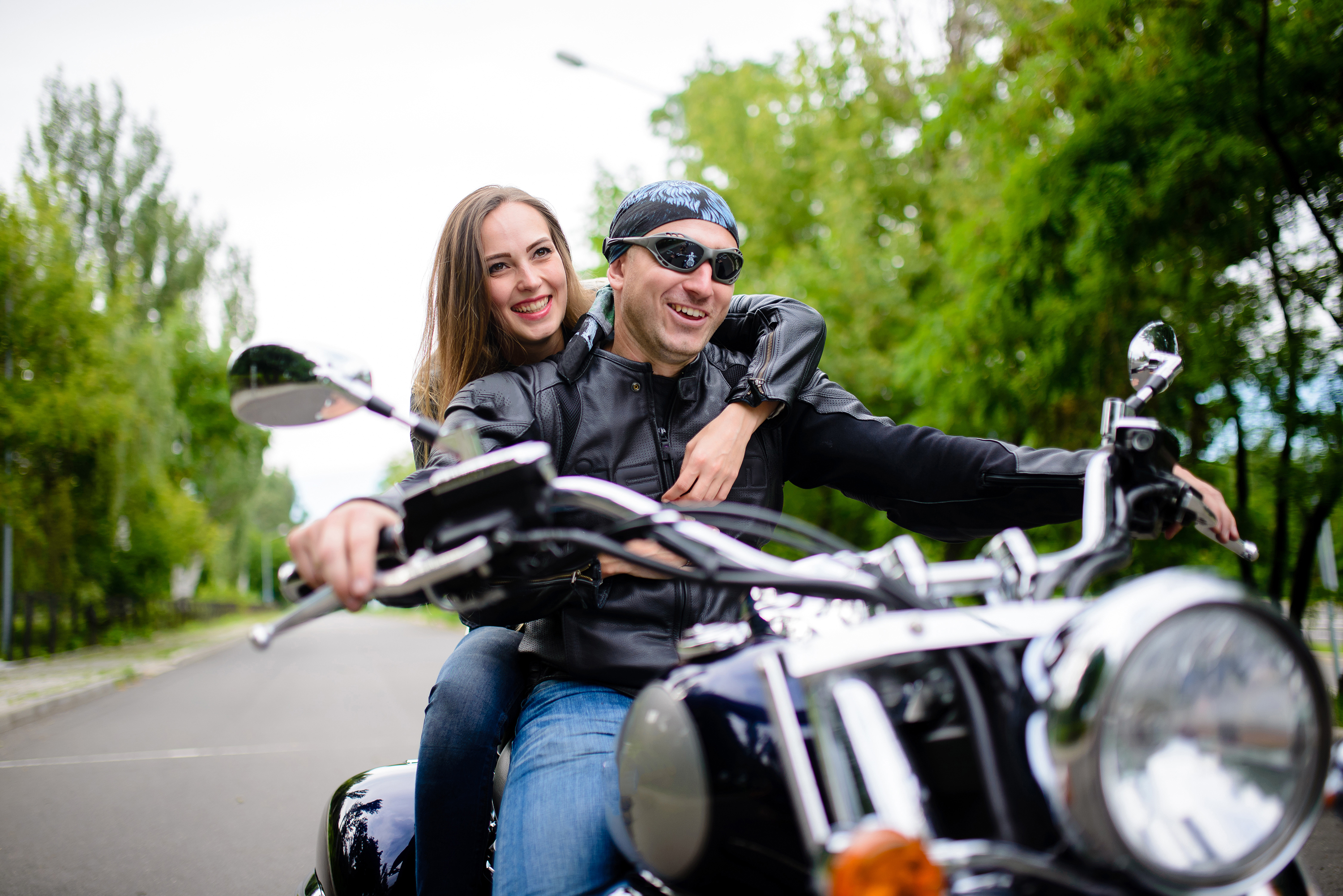 Girl riding guy. Drive Motorcycle Friendship.