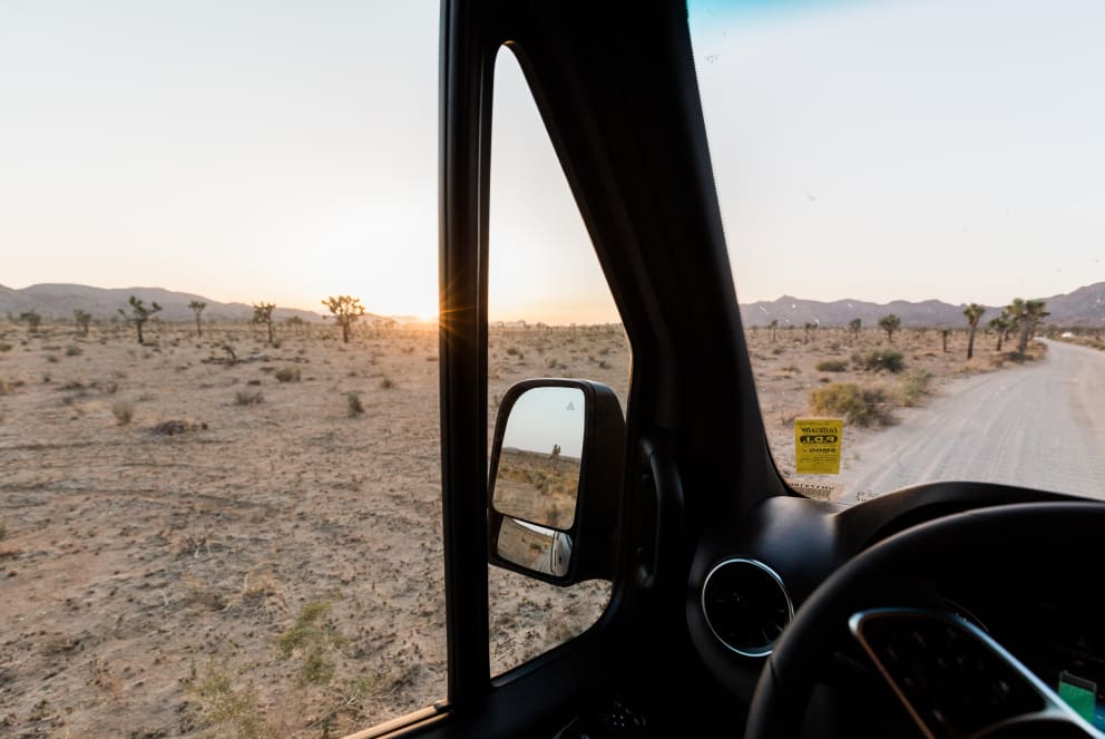 looking out RV window in joshua tree california