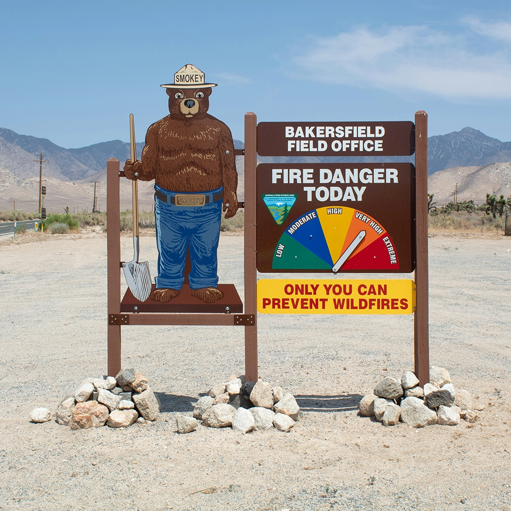SmokeyFireDangerSign.webp