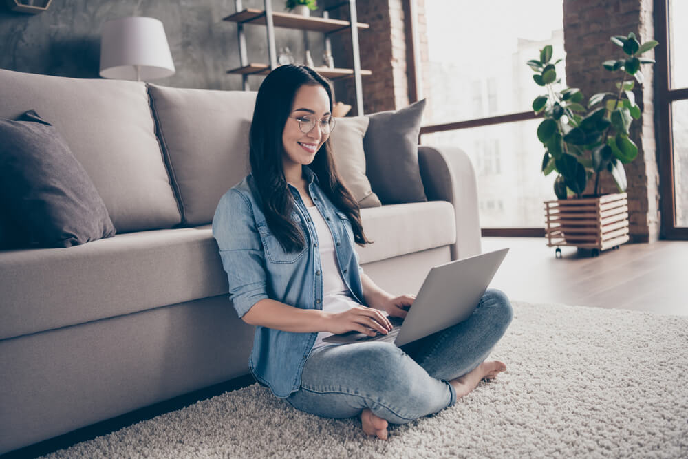 woman getting a title loan online from home