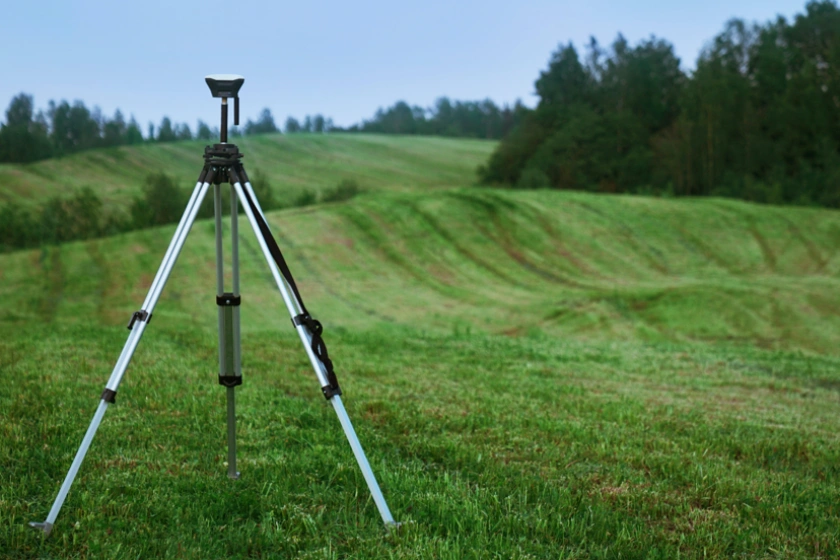 Land surveyor equipment in a field