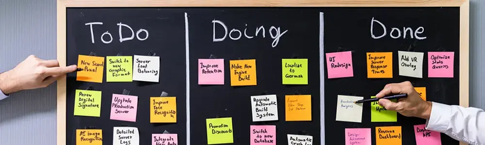 black board with hands placing multiple sticky notes under to do titles