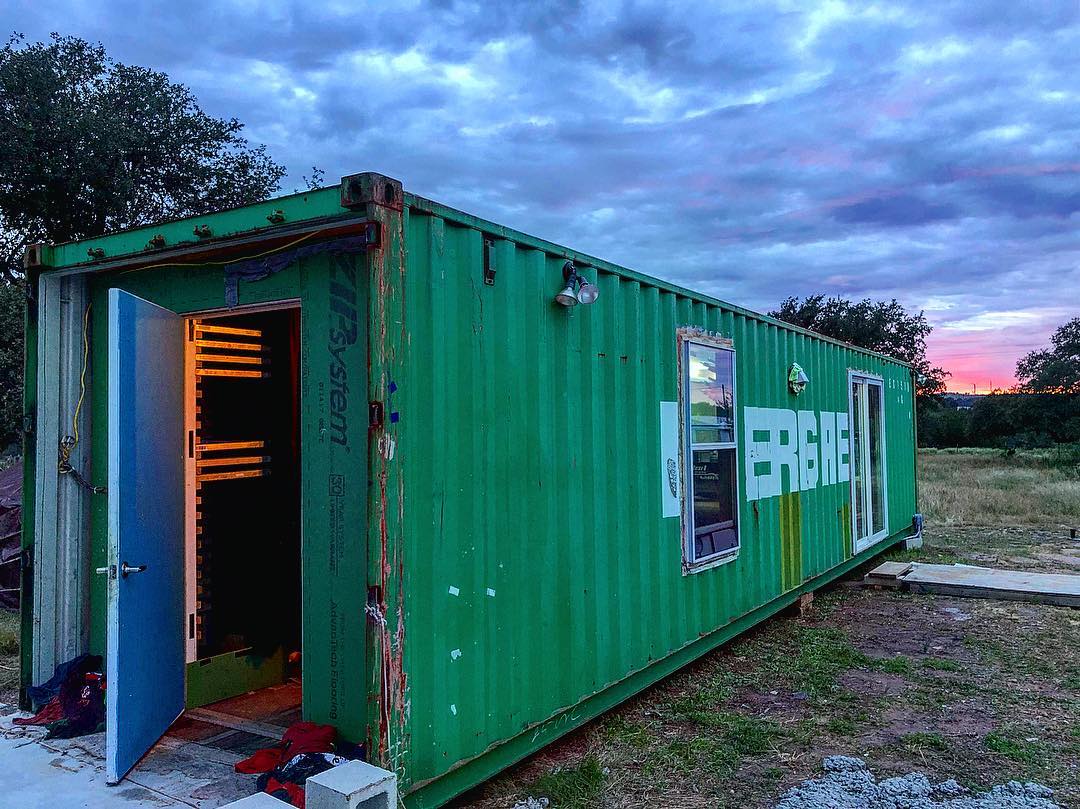 A shipping container converted into a print shop.