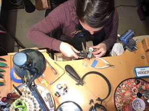 Julia Mancarella working at her jewelry bench