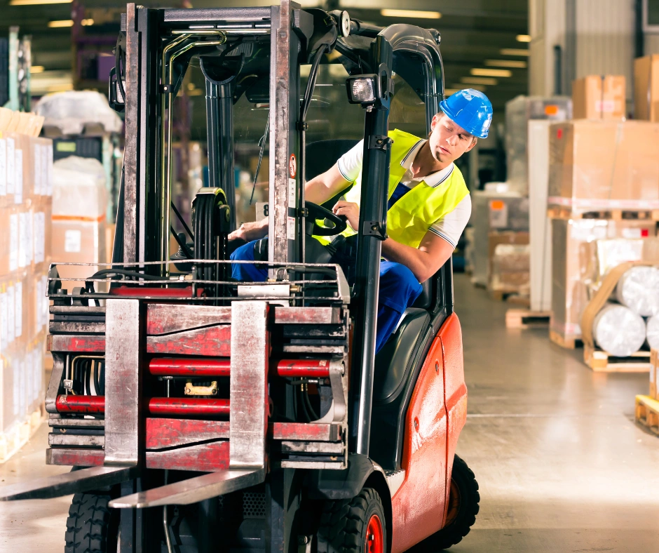 operator driving a forklift