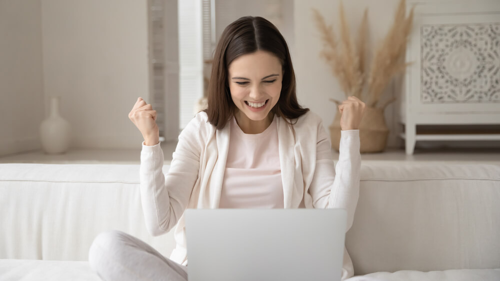 woman happy about getting a Nevada title loan direct deposit