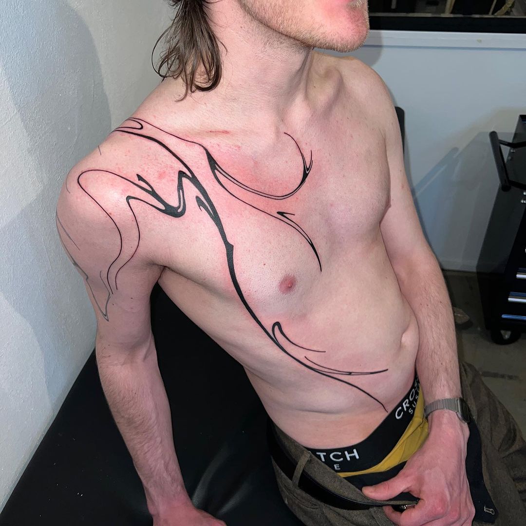 man chest abstract tattoo by tattoo artist nakkab
