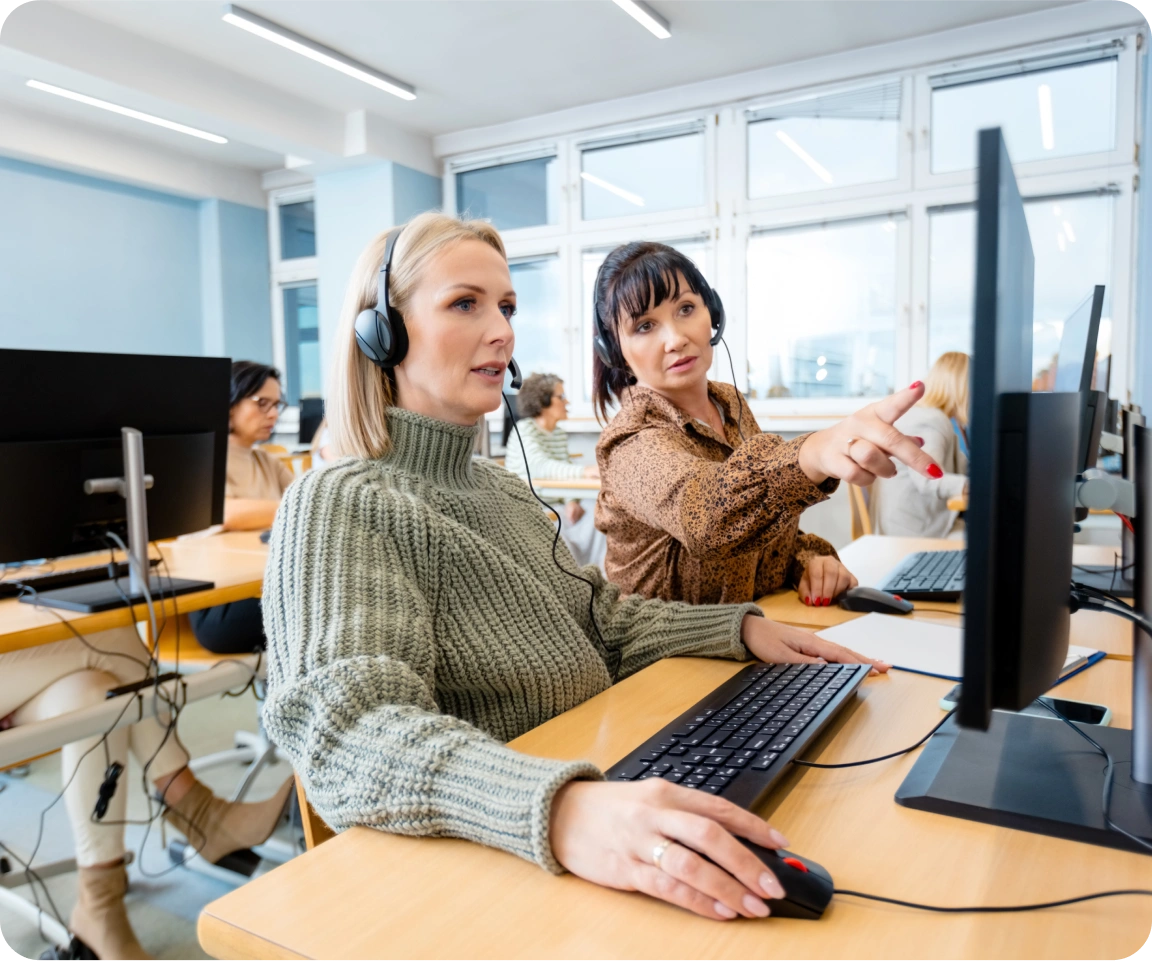 two ladies learning digital skills