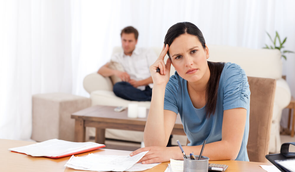 woman thinking about divorce financial solutions