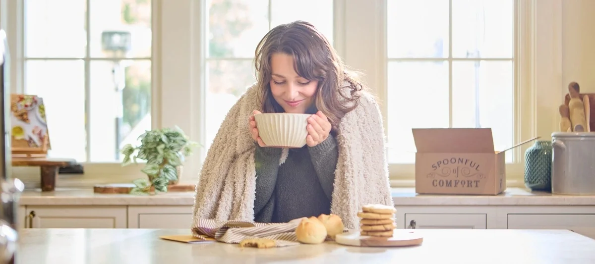 Woman holding Soup Bowl