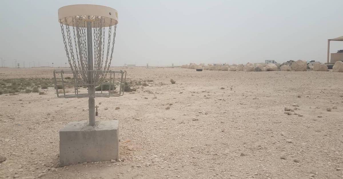 basket in a concrete block in a desert landscape