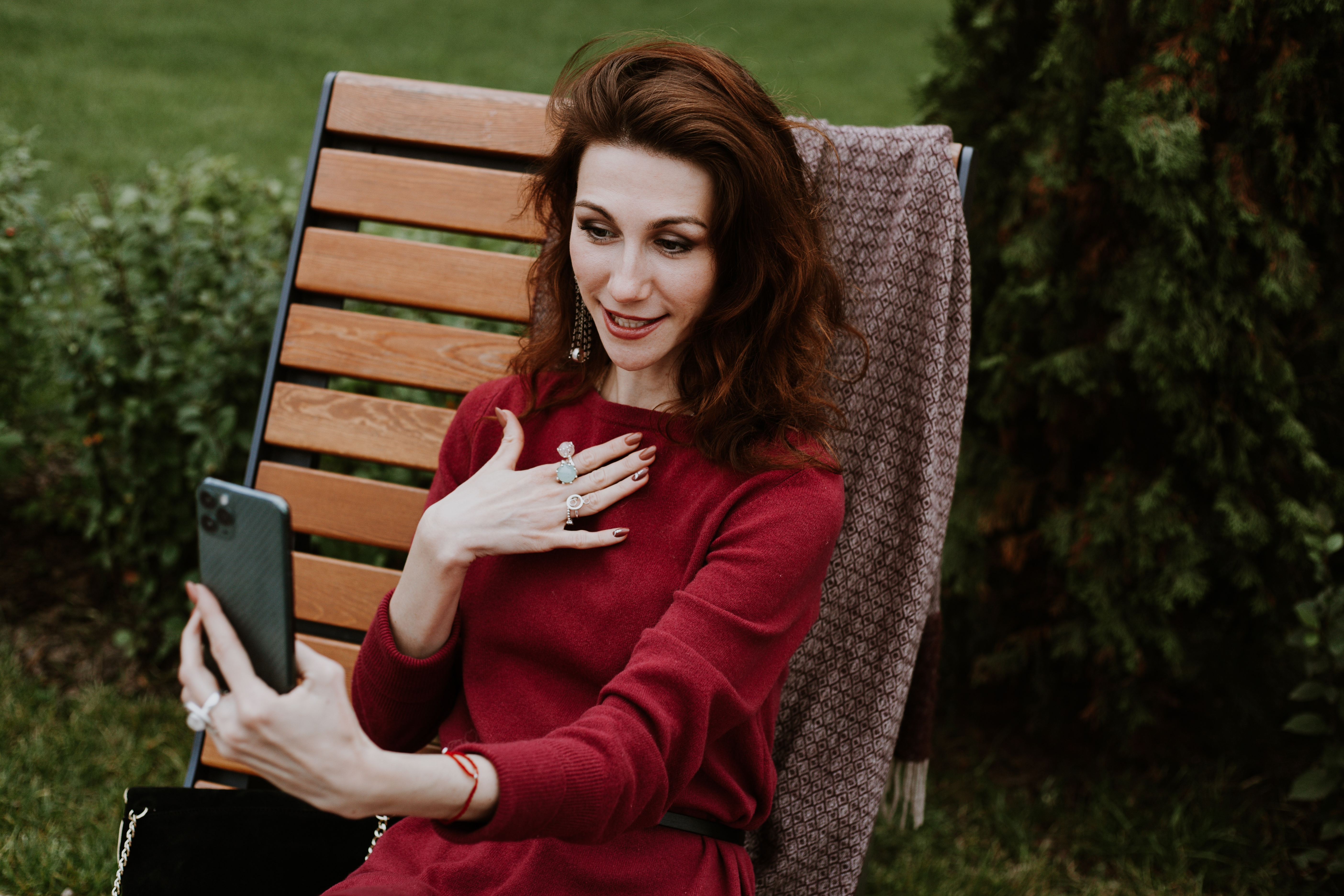 Woman taking a selfie with her jewelry