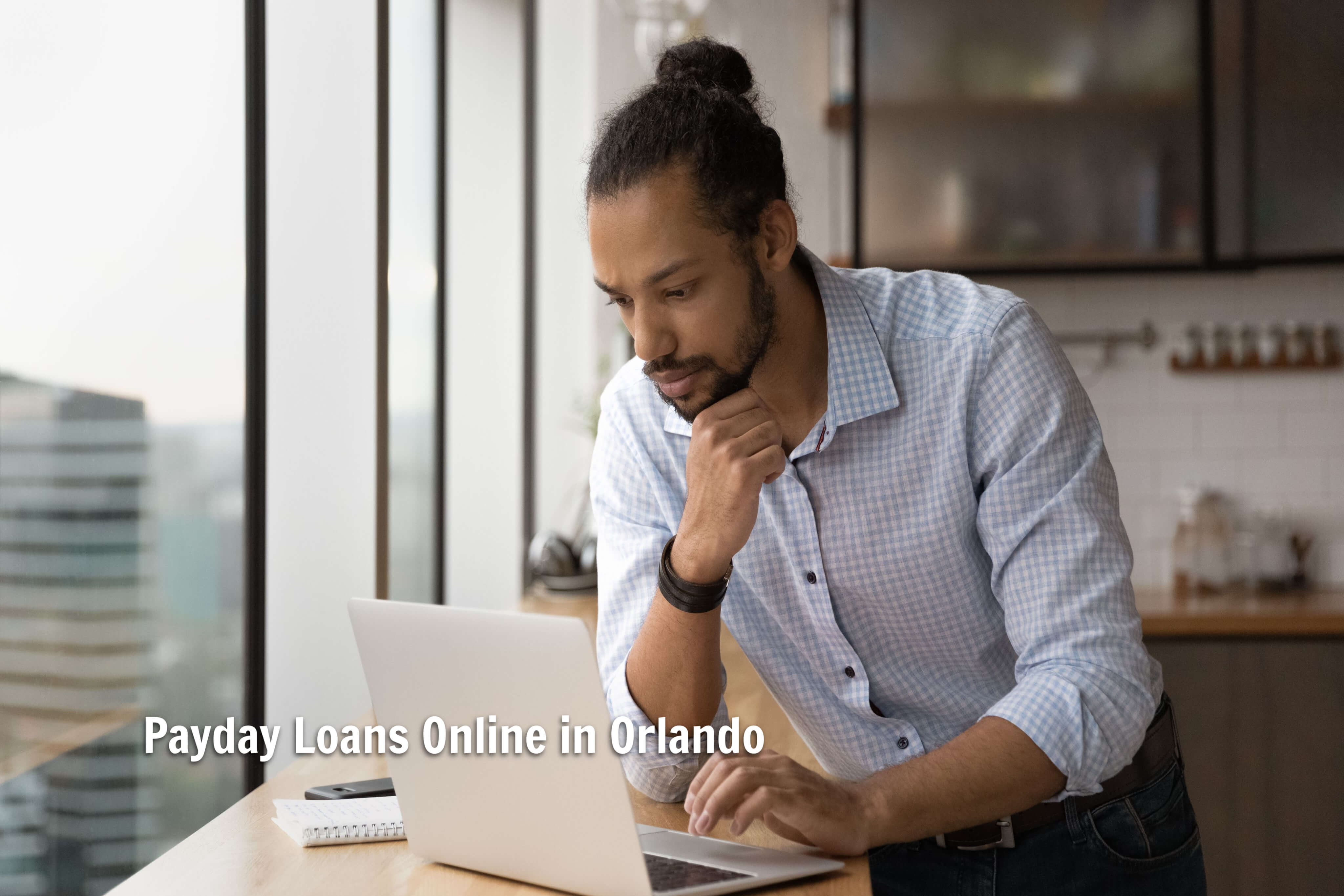 man applying for an Orlando payday loan online