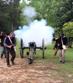 Soldiers firing cannon at Confederate Memorial Park