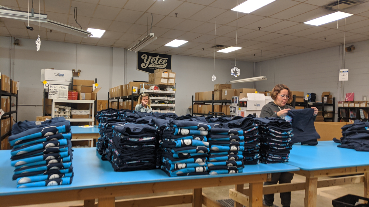 Folding t-shirts at The Yetee is a big task.