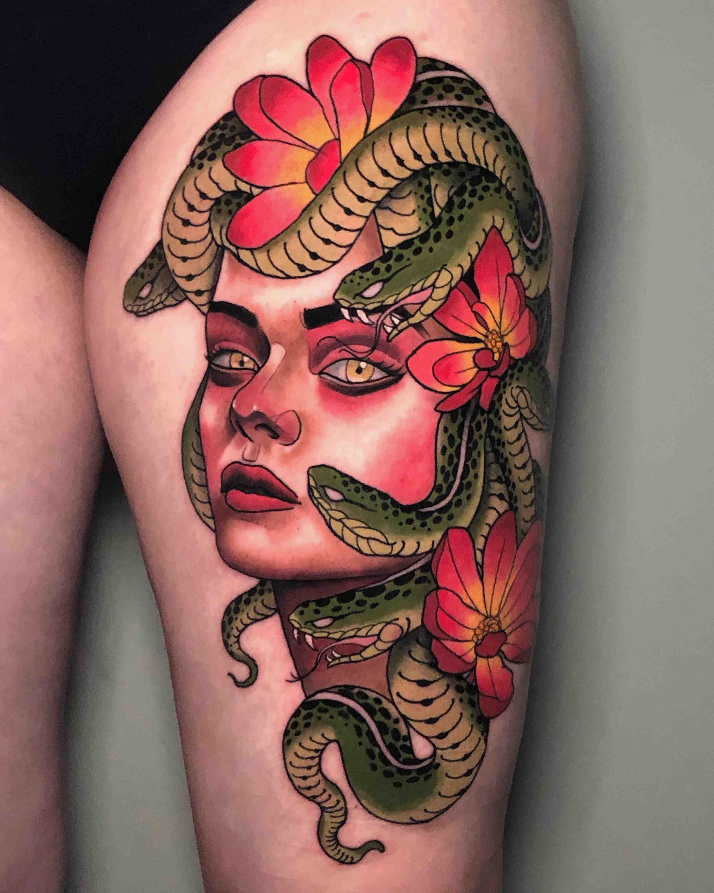 traditional medusa in color with snakes and flowers yellow eyes