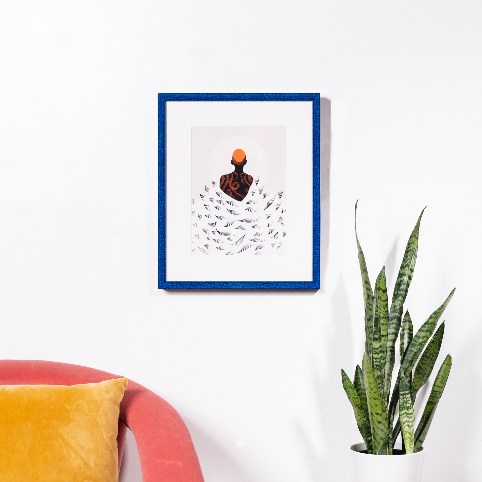 print with silhouette and waves in blue frame