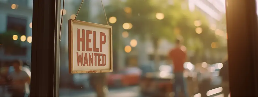 Help wanted sign illustrating talent shortage and hiring challenges