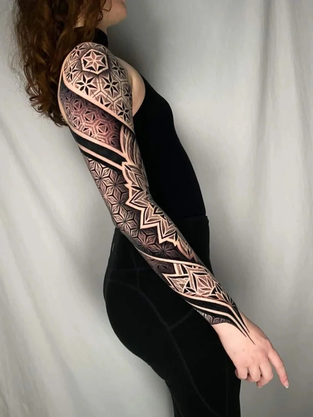 create a full sleeve tattoo design