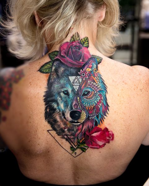 amazing surrealist wolf tattoo