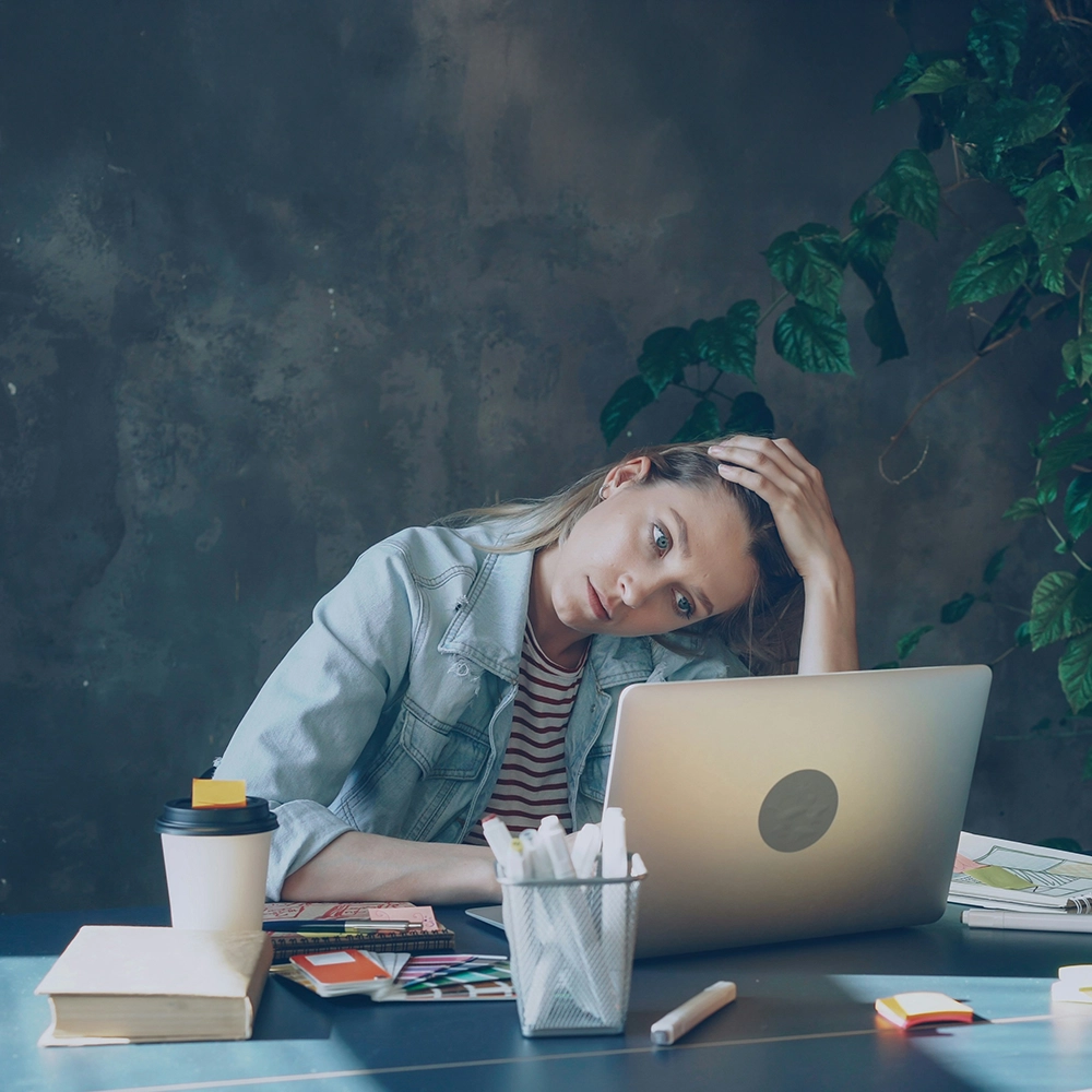 Woman working on homework.webp