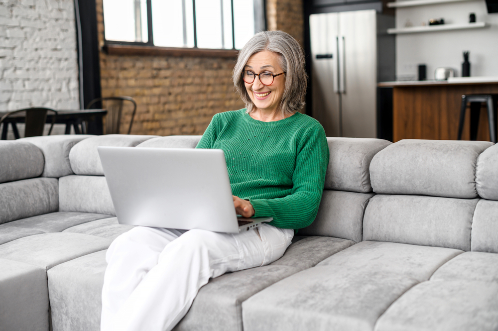 suprised woman on laptop