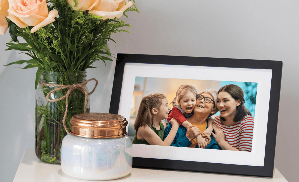 Image of happy family on digital photo frame