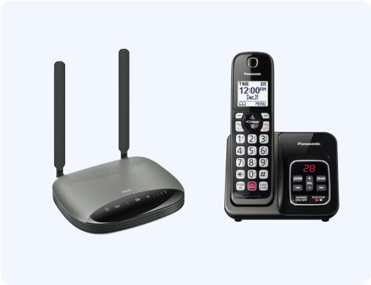 US Mobile Home phone base next to a cordless home phone