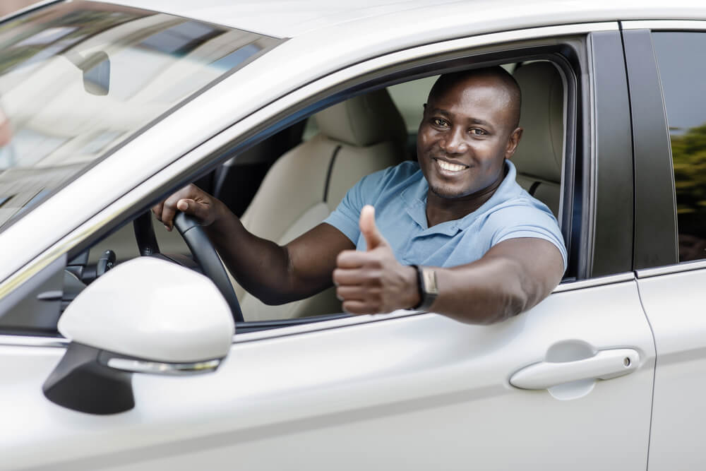 man giving thumbs up for title loan eligibility
