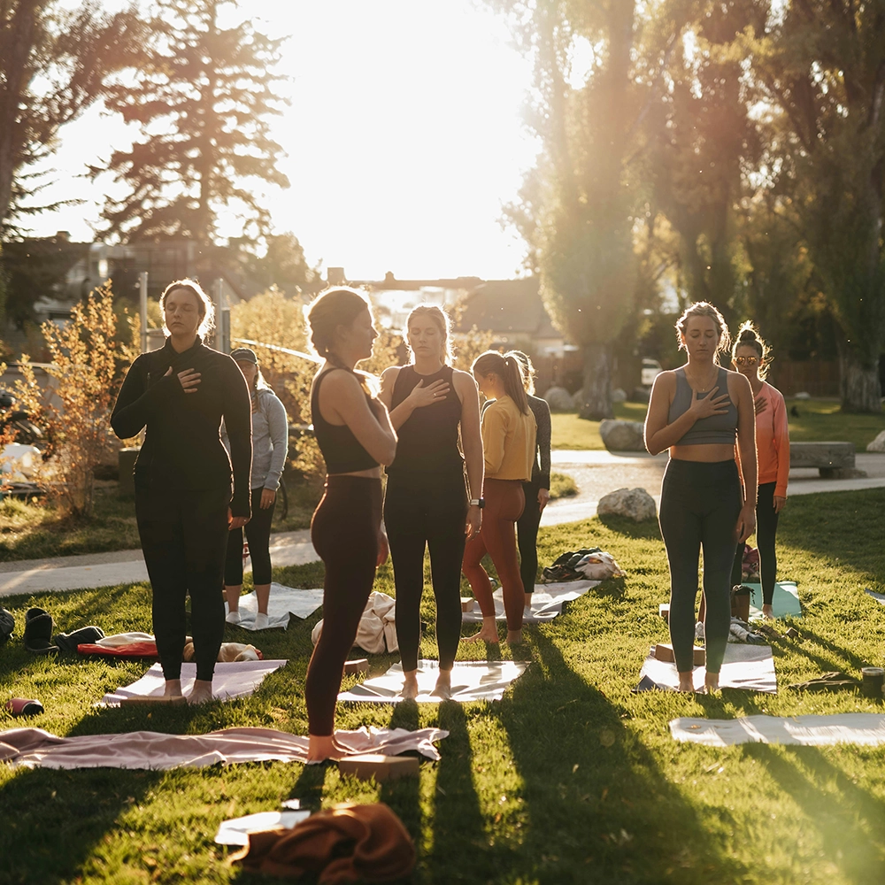 Group yoga class on a wellness trip.